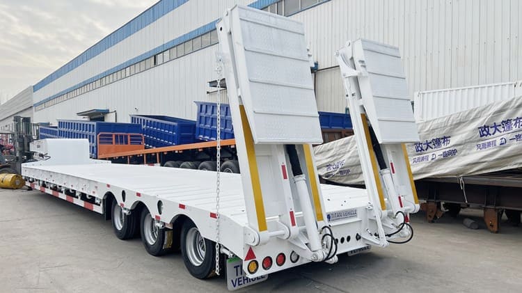 Tri Axle 80 Tons Low Bed Truck Trailer Price in Suriname Comovina